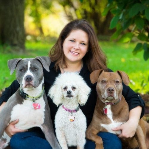 Kristie Halverson the owner and Head dog trainer of FurBabies & Friends in Glendale, AZ in her first family photoshoot with her dogs Baloo, Stella, and Nala.