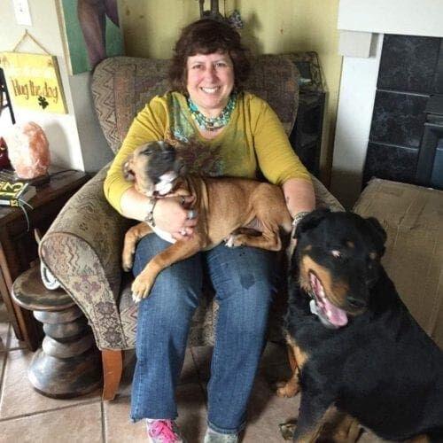 Simian howled with joy when officially adopted by his new forever mom and his new Rottweiler brother.