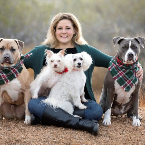 Positive reinforcement dog trainer, Kristie Halverson, the owner and found of FurBabies & Friends, and her 4 dogs during a professional family photo shoot.