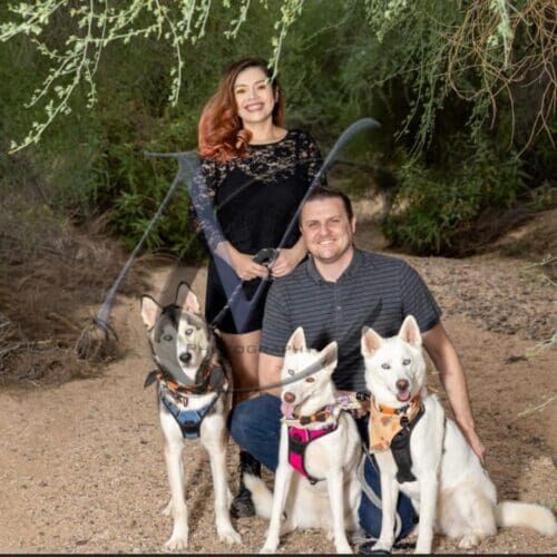 Furbabies & Friends 2022 Fall Family Photoshoot pet parents and their three huskies get professional cute photos in Glendale, AZ.