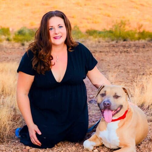 Positive reinforcement dog trainer, Kristie Halverson, owner of Furbabies & Friends and her fawn XL bully Mix Simba during a professional pet photography session.