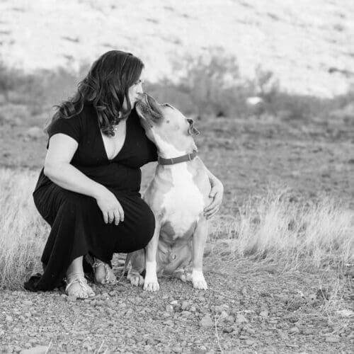 Positive reinforcement dog trainer, Kristie Halverson, owner of Furbabies & Friends and her fawn XL bully Mix Simba during a professional pet photography session.