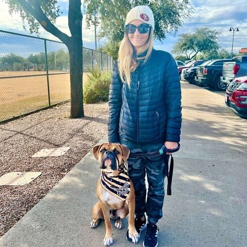 Maverick the Boxer and his mom posing for a graduation photo after successfully completing dog group obedience classes with FurBabies & Friends in Glendale, AZ.