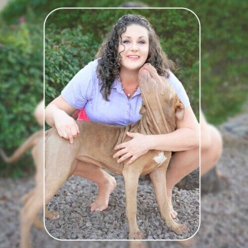 Kristie Halverson, positive reinforcement dog trainer in Glendale, Arizona, and her American Bully Puppy Mella. Kristie Halverson, positive reinforcement dog trainer in Glendale, Arizona, and her American Bully Puppy Mella.