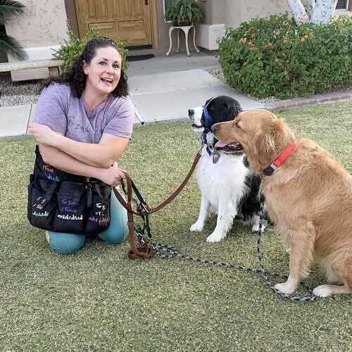 Dog trainer Kristie with Abbey and Luna after a leash training session in Glendale, AZ
